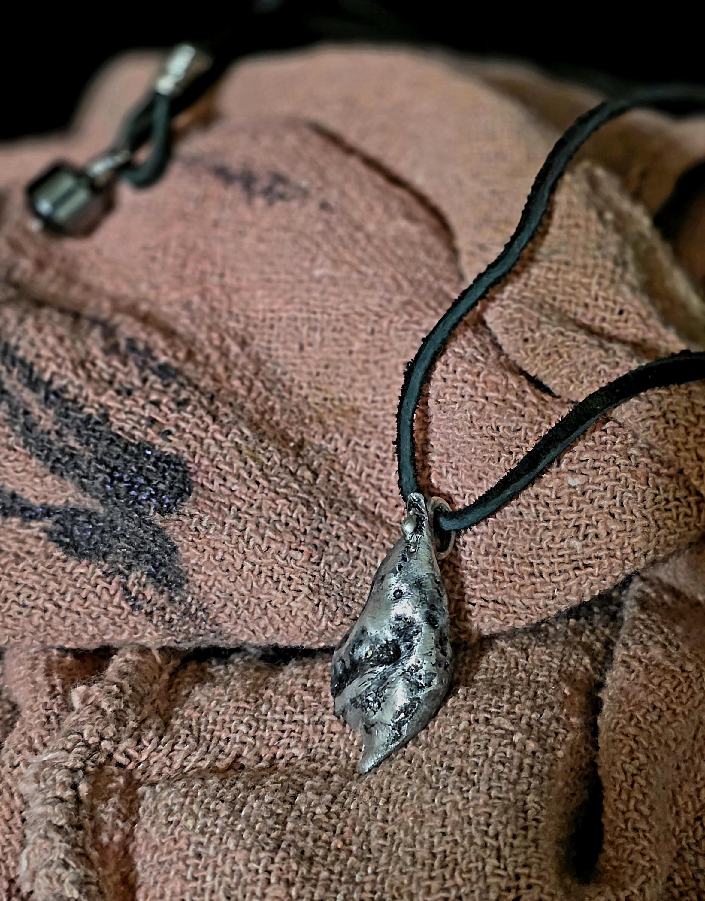 The Warrior’s Tear Pendant – UNBROKEN Kaua’i Aluminum Relic Necklace, Handmade Men’s Warrior Jewelry, Leather Cord, Hematite Closure