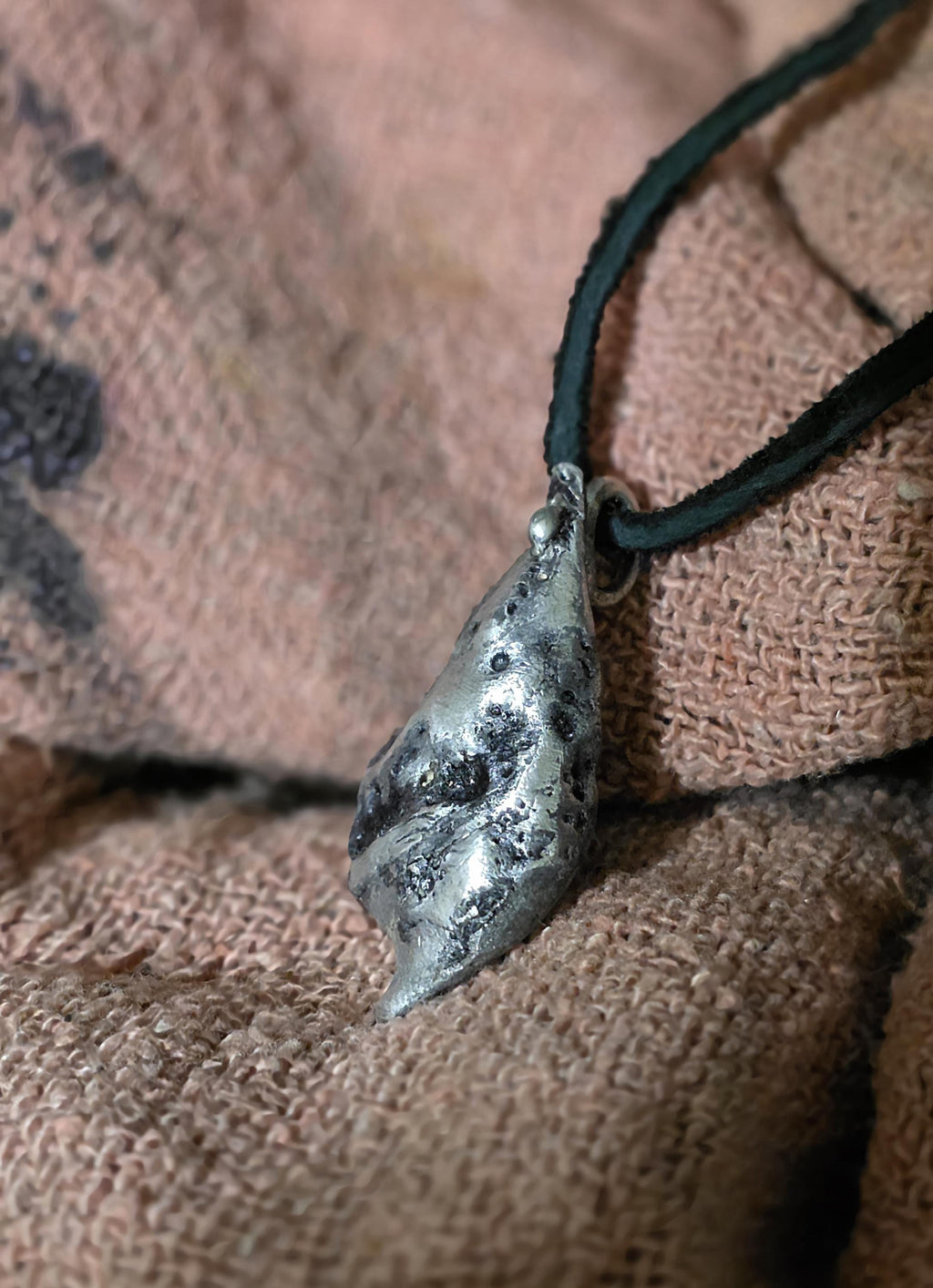 The Warrior’s Tear Pendant – UNBROKEN Kaua’i Aluminum Relic Necklace, Handmade Men’s Warrior Jewelry, Leather Cord, Hematite Closure