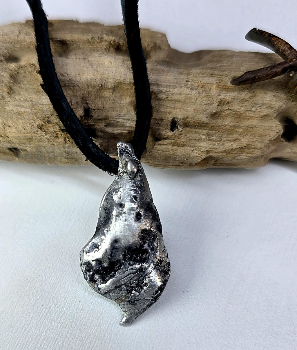 The Warrior’s Tear Pendant – UNBROKEN Kaua’i Aluminum Relic Necklace, Handmade Men’s Warrior Jewelry, Leather Cord, Hematite Closure